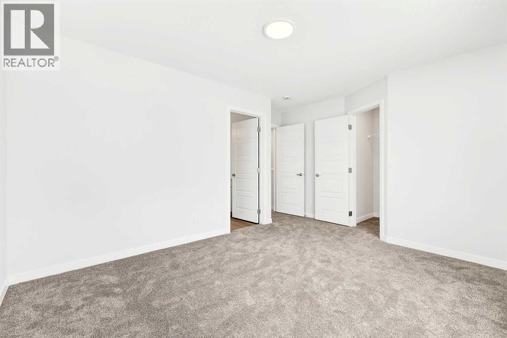 302, 40 Creekside Way SW, Calgary, Alberta  T2X 6E2 - Photo 22 - A2334887