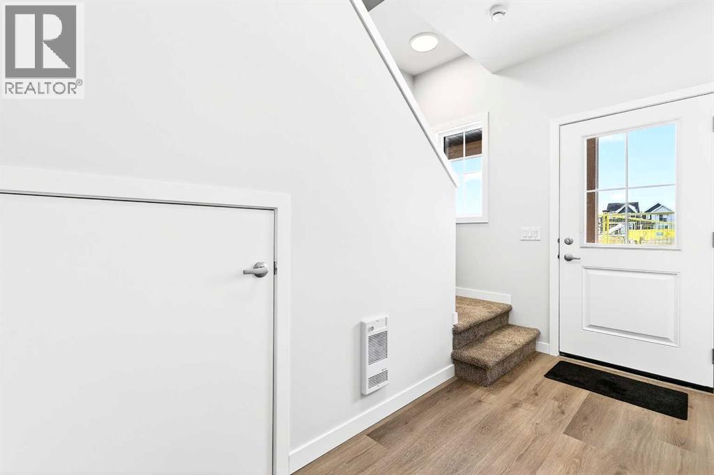 302, 40 Creekside Way SW, Calgary, Alberta  T2X 6E2 - Photo 3 - A2334887