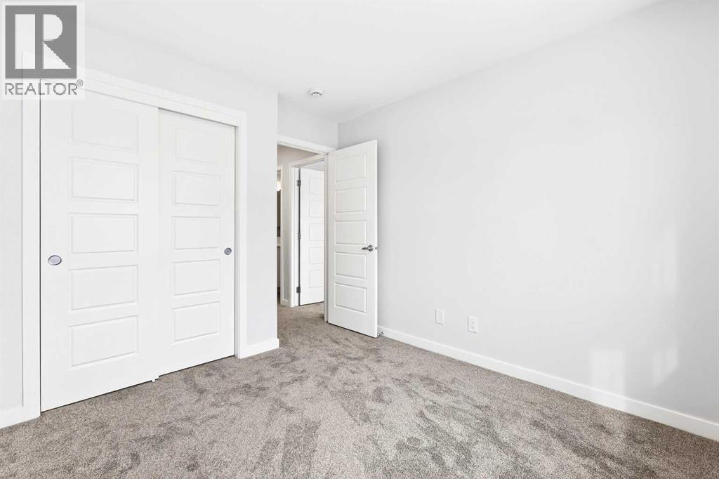 302, 40 Creekside Way SW, Calgary, Alberta  T2X 6E2 - Photo 29 - A2334887