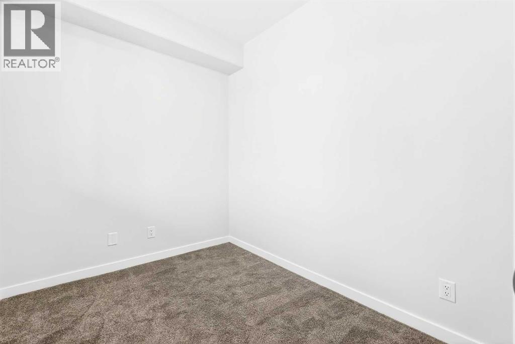 302, 40 Creekside Way SW, Calgary, Alberta  T2X 6E2 - Photo 5 - A2334887