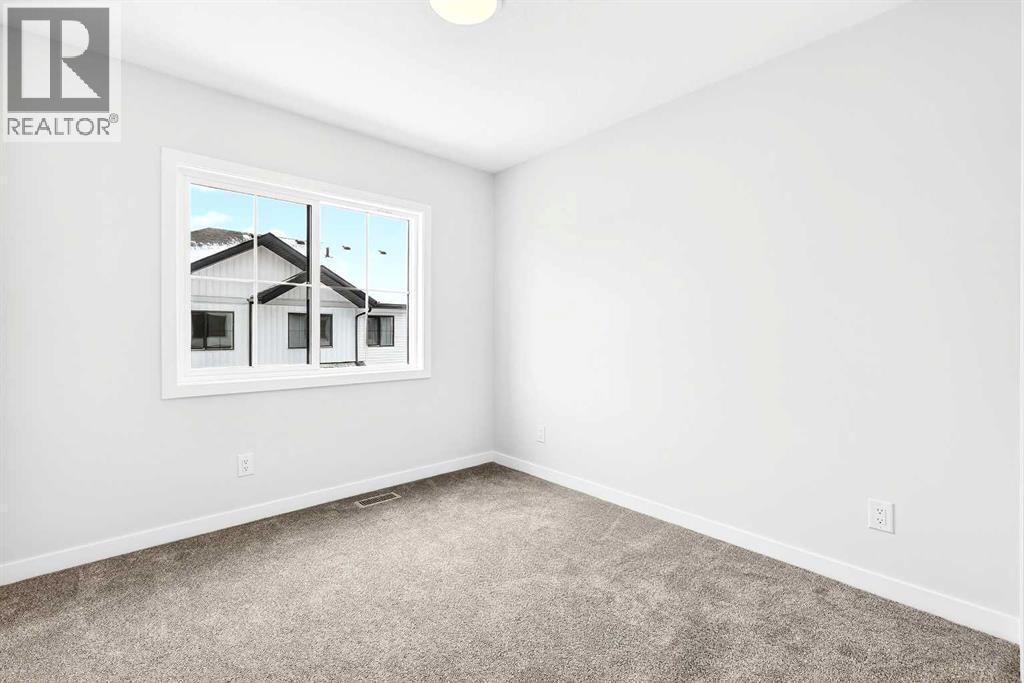 302, 40 Creekside Way SW, Calgary, Alberta  T2X 6E2 - Photo 28 - A2334887