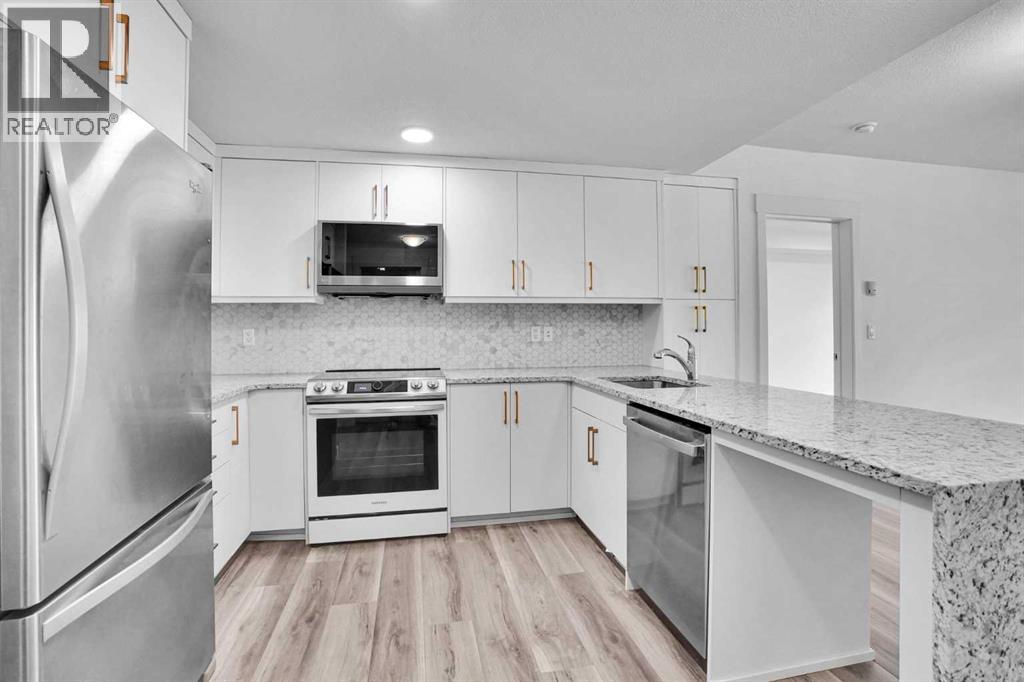 214, 15 Aspenmont Heights SW, Calgary, Alberta  T3H 0E3 - Photo 10 - A2318511