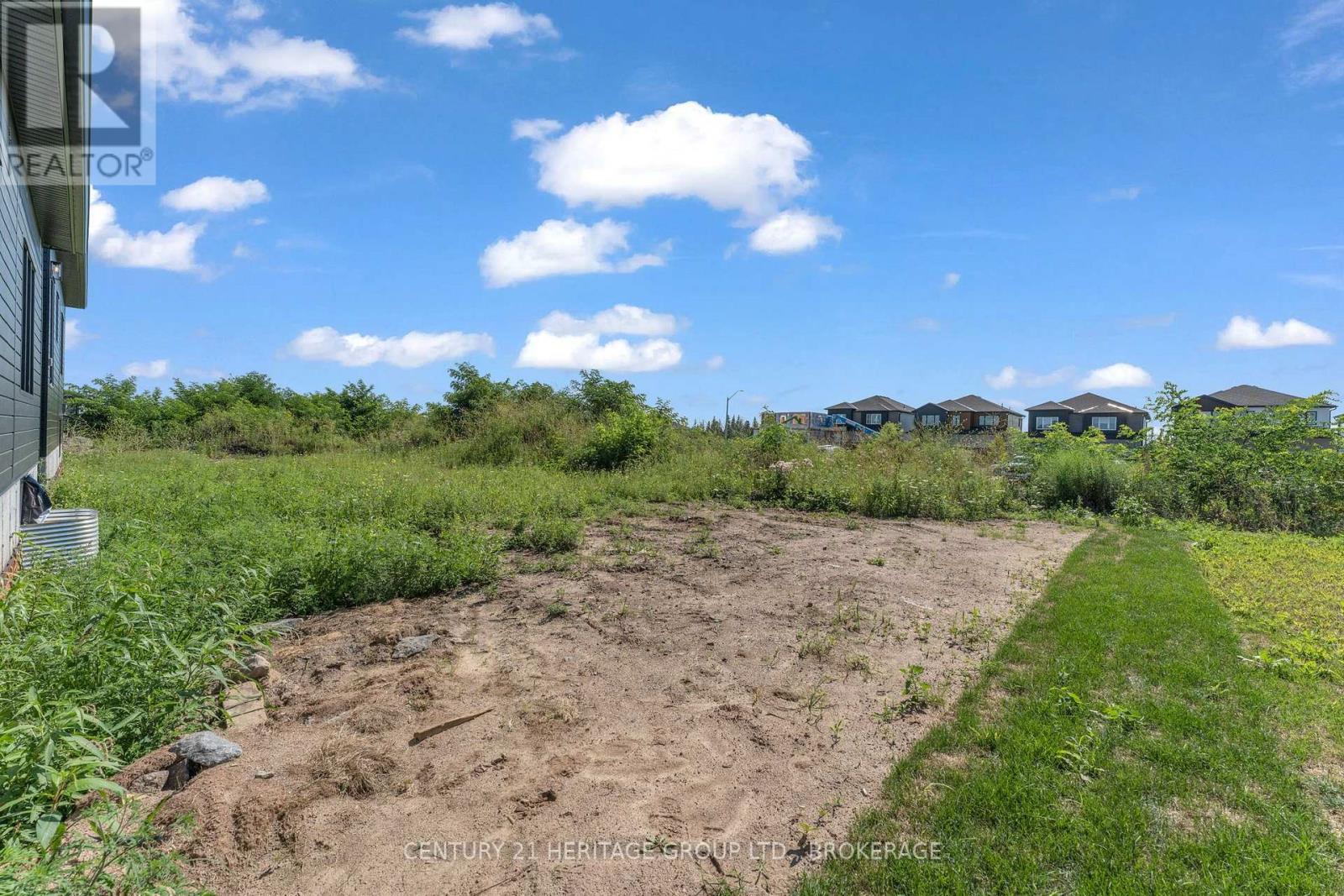 56 Dusenbury Drive, Loyalist, Ontario K0H 1N0 - Photo 2 - X13653020