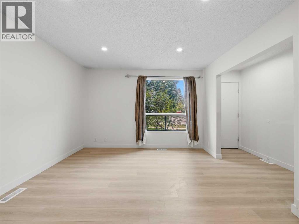 6506 Ranchview Drive NW, Calgary, Alberta  T3G 1A1 - Photo 8 - A2335457
