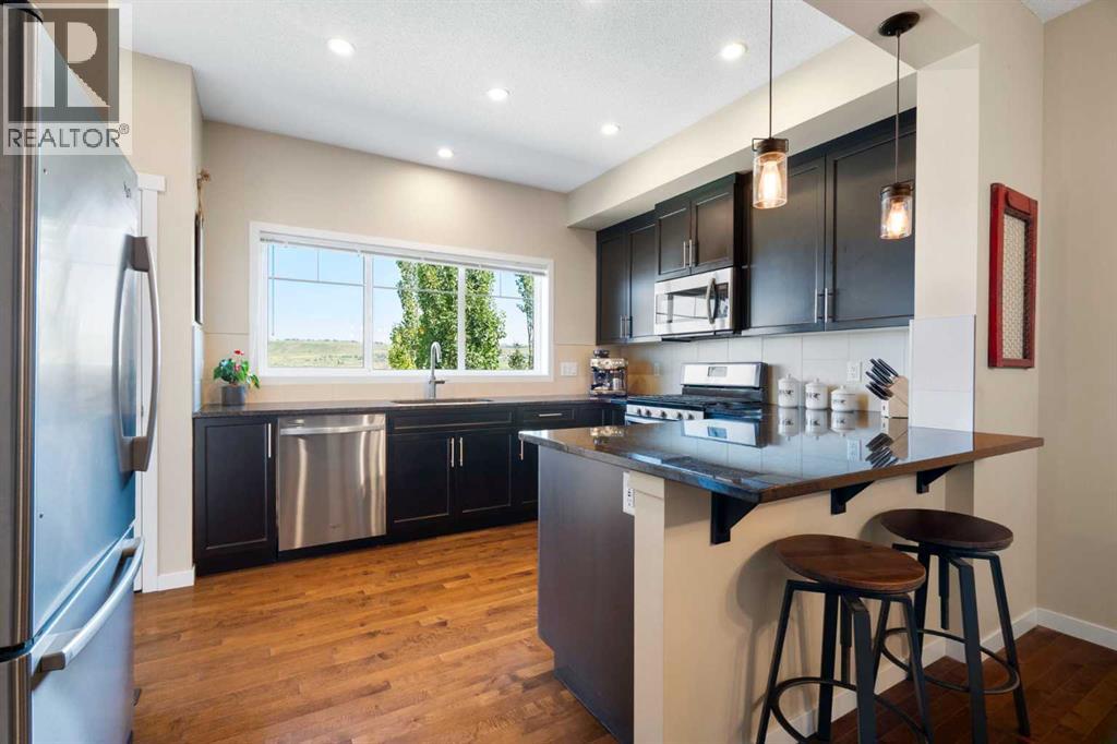 734 River Heights Crescent, Cochrane, Alberta  T4C 0J4 - Photo 12 - A2334967