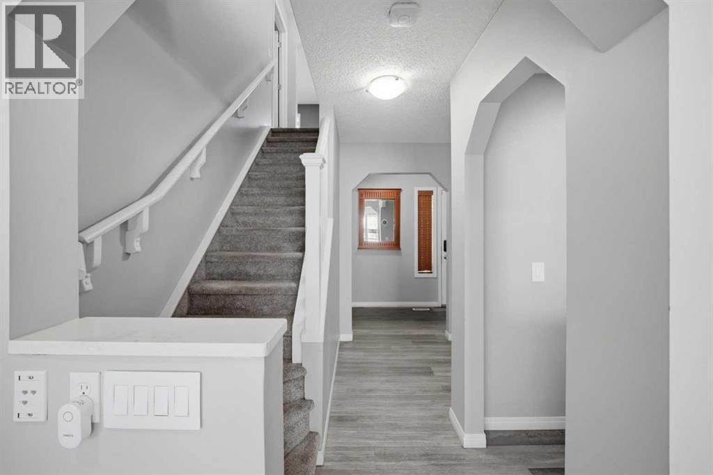 84 Cougar Ridge Circle Sw, Calgary, Alberta T3H 5C8 - Photo 9 - A2335470