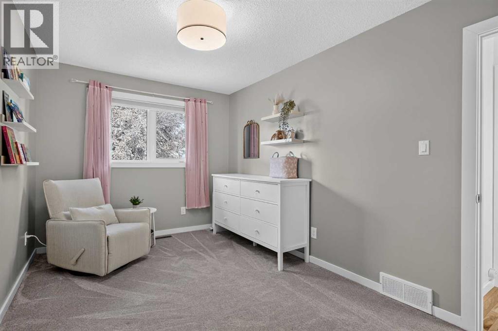 140 Woodglen Way SW, Calgary, Alberta  T2W 4T3 - Photo 21 - A2333631