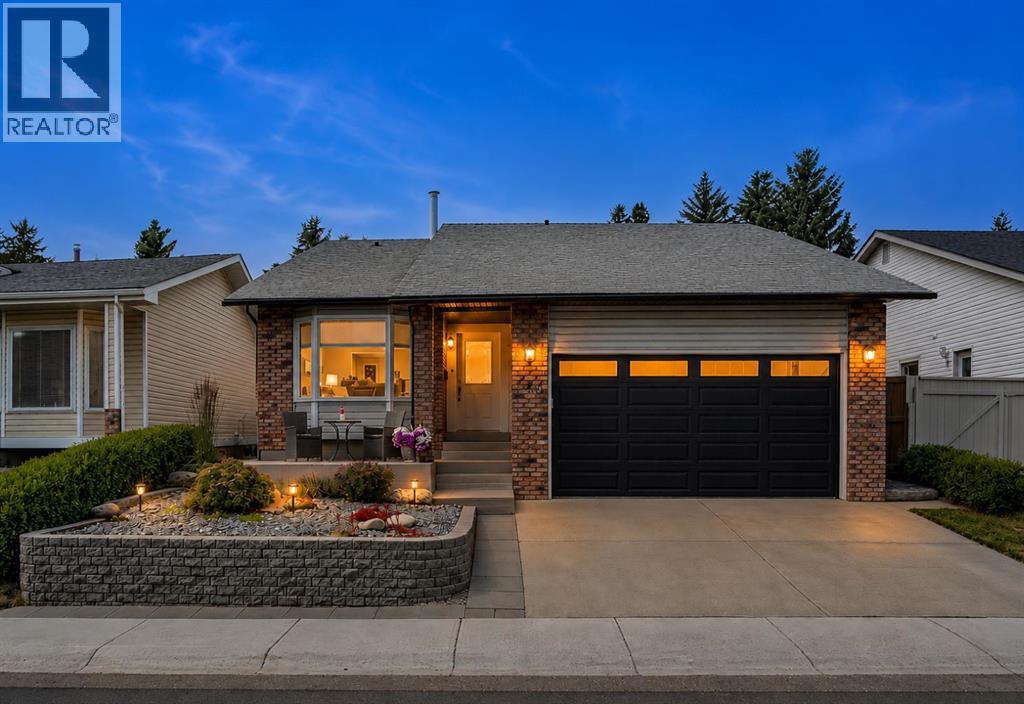 140 Woodglen Way SW, Calgary, Alberta  T2W 4T3 - Photo 1 - A2333631