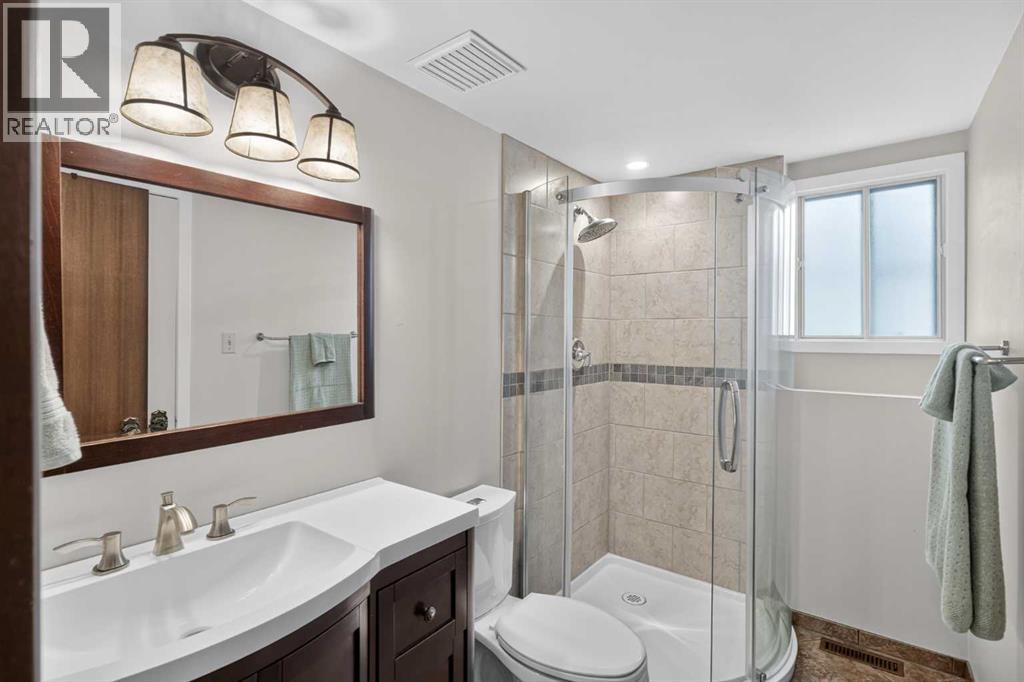 140 Woodglen Way SW, Calgary, Alberta  T2W 4T3 - Photo 29 - A2333631