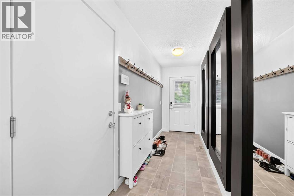 512 Sage Hill Grove Nw, Calgary, Alberta T3R 0Z8 - Photo 4 - A2335817