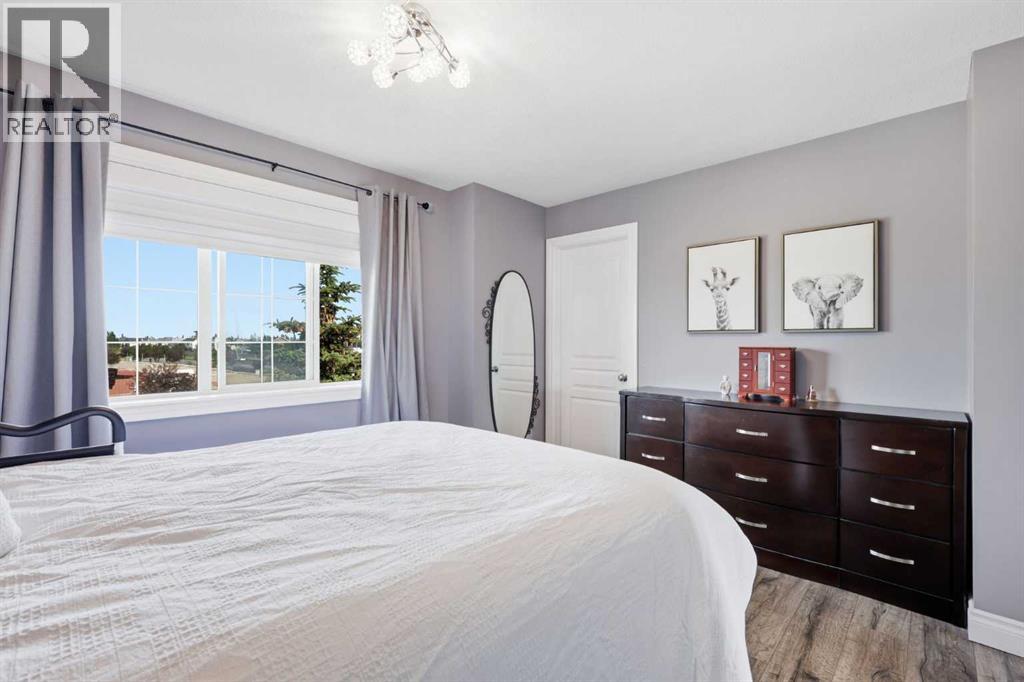 4 Cougar Ridge Mews Sw, Calgary, Alberta  T3H 5P4 - Photo 26 - A2327348