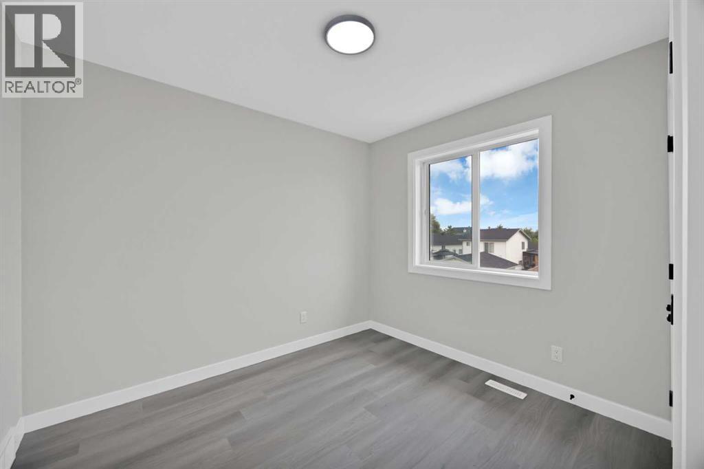 68 Laguna Close NE, Calgary, Alberta  T1Y 7B1 - Photo 25 - A2332163