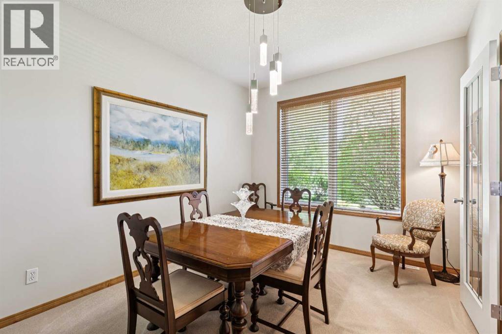 511 Rocky Ridge Drive NW, Calgary, Alberta  T3G 5C3 - Photo 4 - A2319538