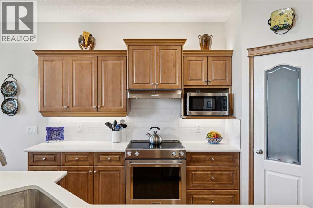 511 Rocky Ridge Drive NW, Calgary, Alberta  T3G 5C3 - Photo 6 - A2319538