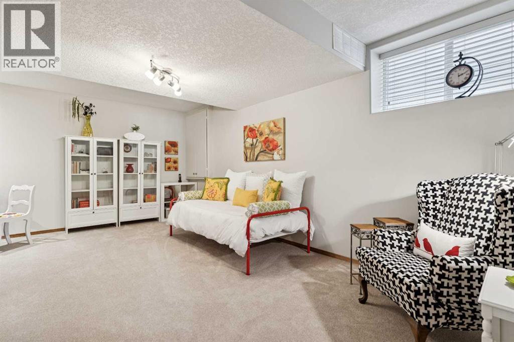 511 Rocky Ridge Drive NW, Calgary, Alberta  T3G 5C3 - Photo 33 - A2319538
