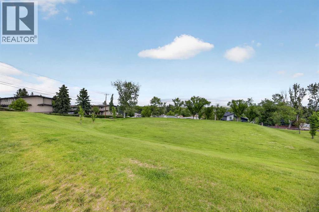7035 Huntercrest Road Nw, Calgary, Alberta T2K 4J9 - Photo 3 - A2319970