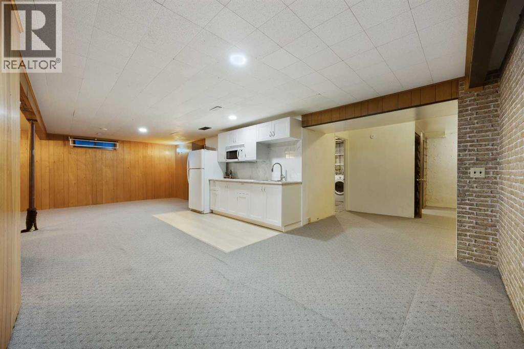 7035 Huntercrest Road Nw, Calgary, Alberta T2K 4J9 - Photo 30 - A2319970