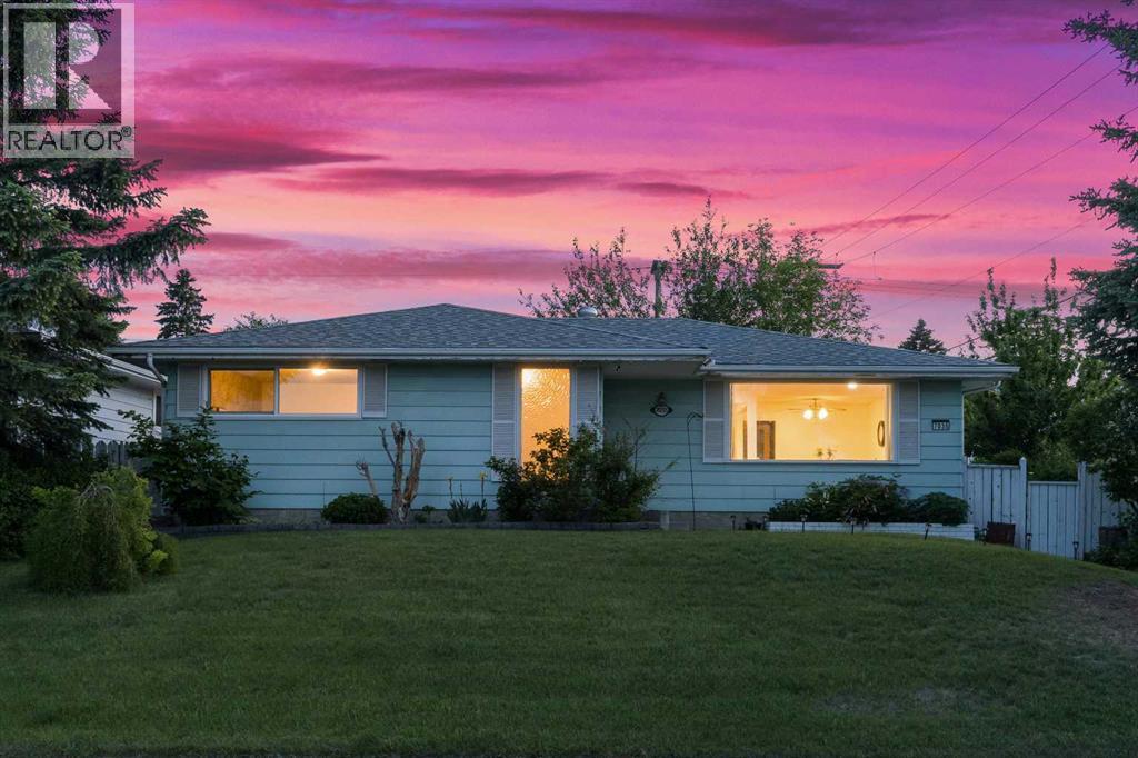 7035 Huntercrest Road Nw, Calgary, Alberta T2K 4J9 - Photo 2 - A2319970