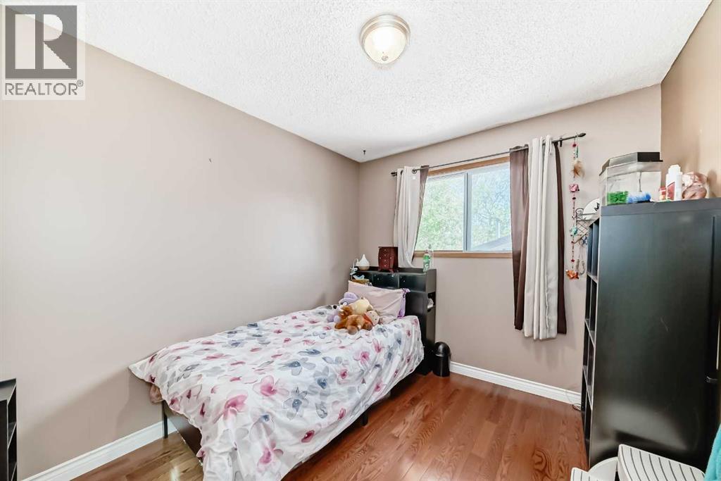 52 Beacham Road NW, Calgary, Alberta  T3K 1S4 - Photo 14 - A2312179