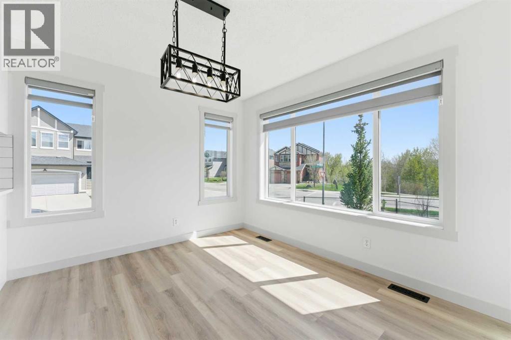 110 Tuscany Summit Green NW, Calgary, Alberta T3L 0B8 - Photo 5 - A2315282