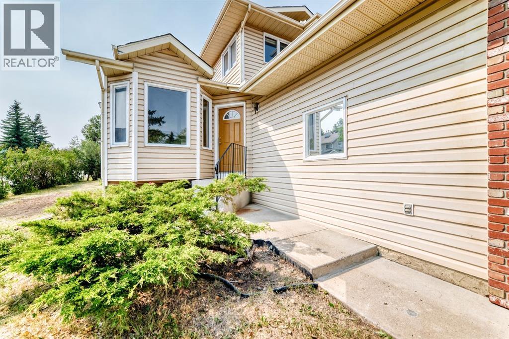434 Millrise Drive SW, Calgary, Alberta  T2Y 2W5 - Photo 2 - A2335546