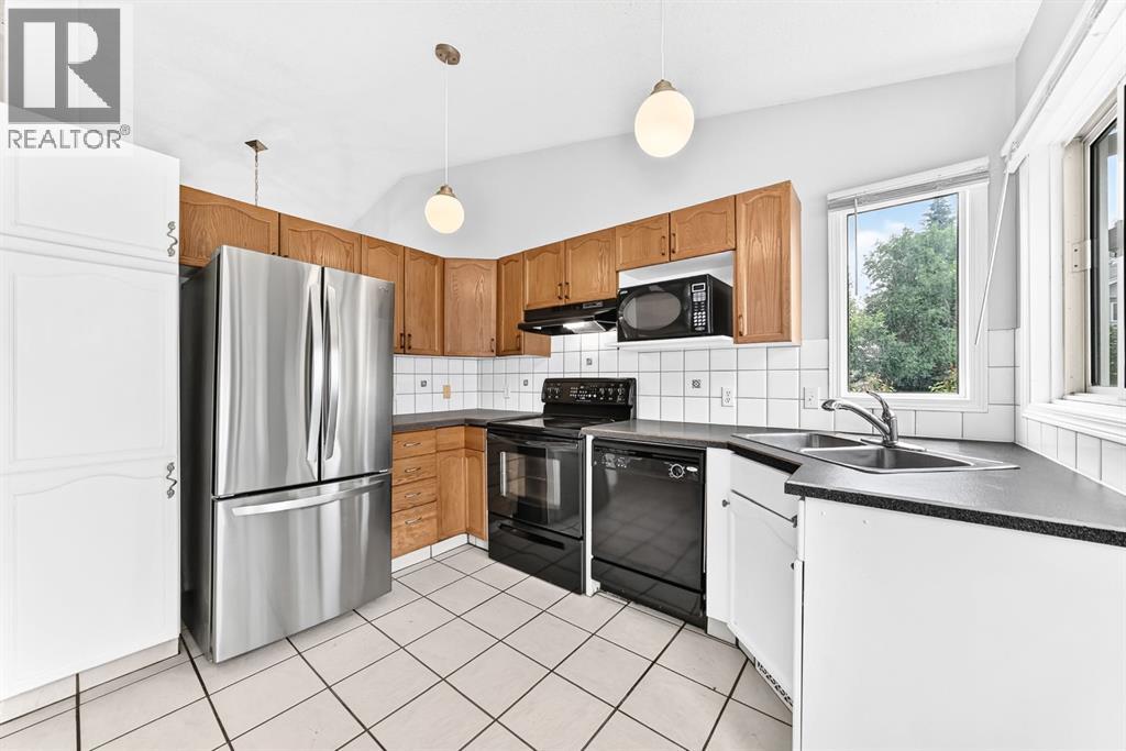 434 Millrise Drive SW, Calgary, Alberta  T2Y 2W5 - Photo 8 - A2335546