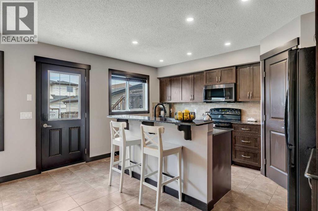 91 Panora Square NW, Calgary, Alberta  T3K 0R3 - Photo 12 - A2331507
