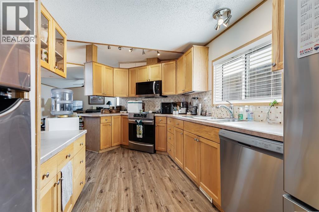 806 Beckner Crescent, Carstairs, Alberta  T0M 0N0 - Photo 6 - A2335859