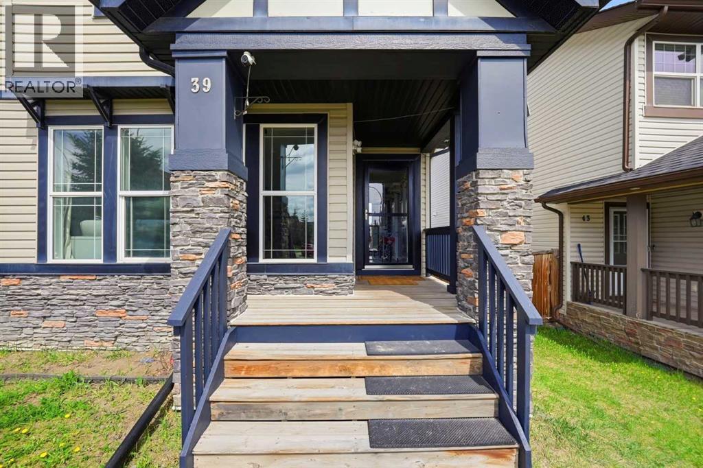 39 Panora Square NW, Calgary, Alberta  T3K 0R8 - Photo 4 - A2308754