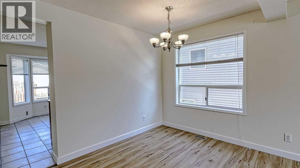 157 Harvest Gold Heights NE, Calgary, Alberta  T3K 4H2 - Photo 9 - A2335872