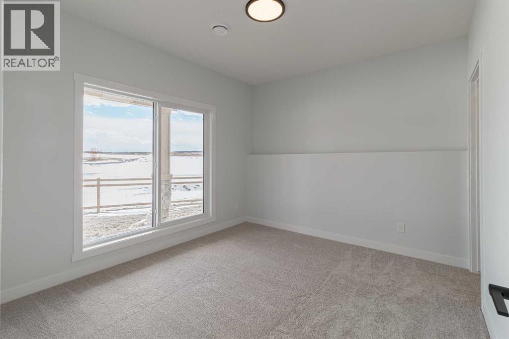 125 Monarch Bend, Rural Rocky View County, Alberta  T3Z 0K4 - Photo 29 - A2333122