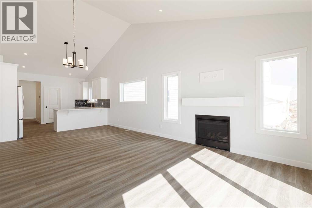 125 Monarch Bend, Rural Rocky View County, Alberta  T3Z 0K4 - Photo 12 - A2333122