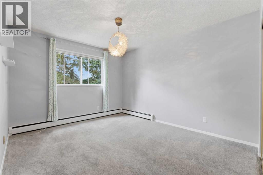 104, 3130 66 Avenue SW, Calgary, Alberta  T3E 5K8 - Photo 36 - A2335656
