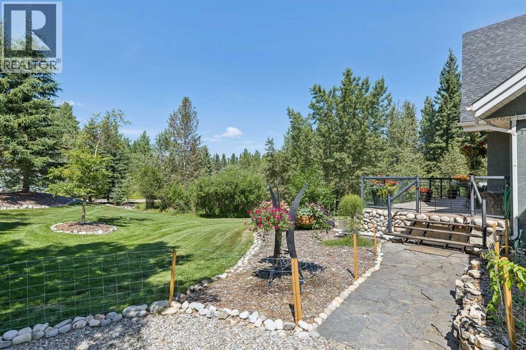 119 Wild Rose Close, Bragg Creek, Alberta  T0L 0K0 - Photo 46 - A2333443