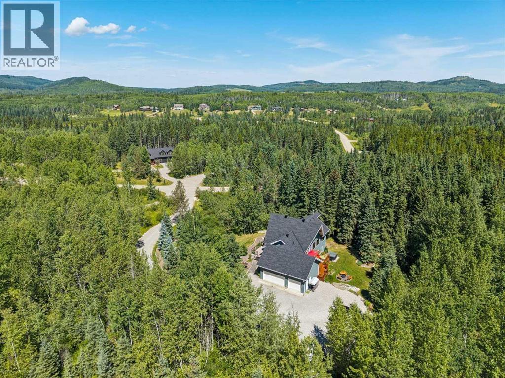 119 Wild Rose Close, Bragg Creek, Alberta  T0L 0K0 - Photo 47 - A2333443
