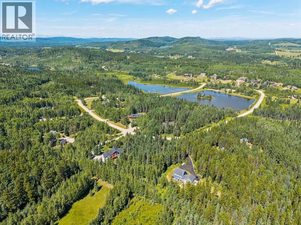 119 Wild Rose Close, Bragg Creek, Alberta  T0L 0K0 - Photo 49 - A2333443