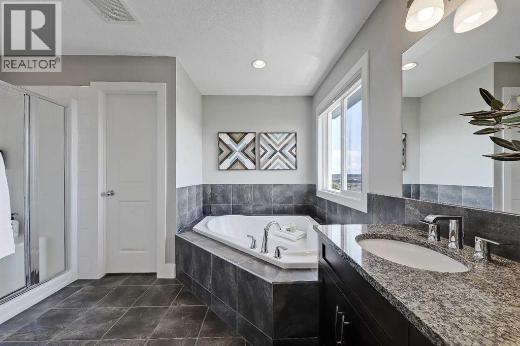 64 Heritage Green, Cochrane, Alberta  T4C 0L3 - Photo 24 - A2324432