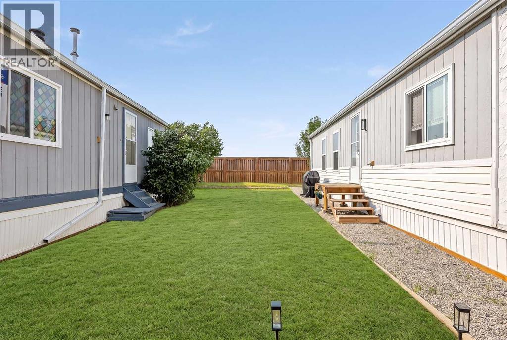 64, 1101 84 Street NE, Calgary, Alberta  T2A 7X2 - Photo 32 - A2334772