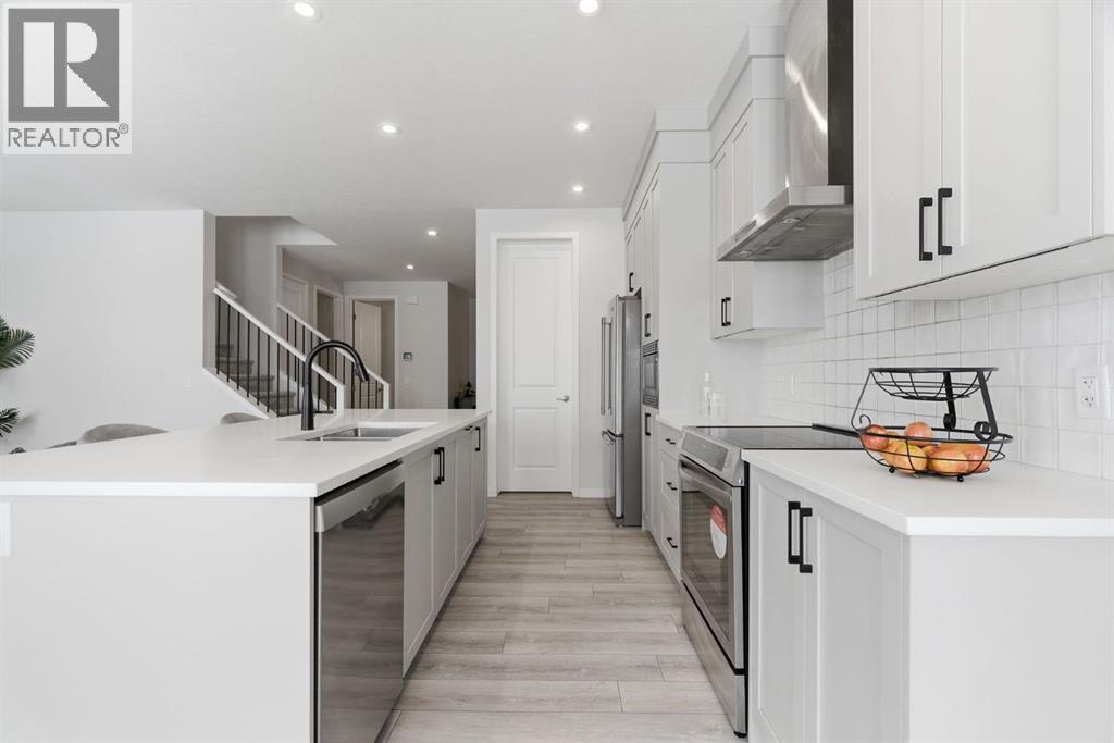 54 Belmont Manor SW, Calgary, Alberta  T2X 5E4 - Photo 6 - A2332752