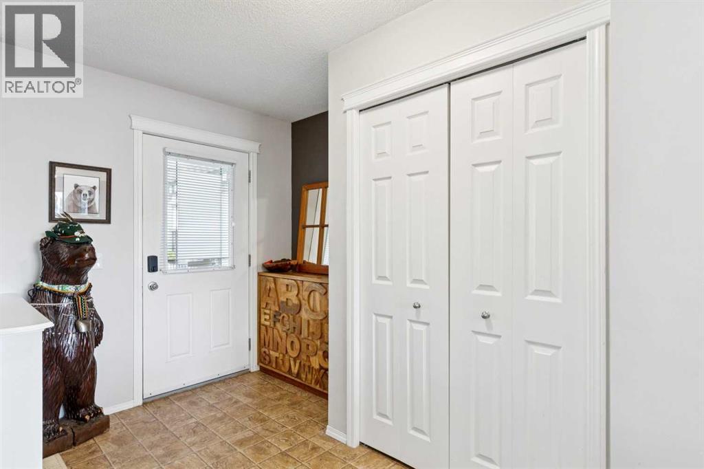 147 Sunset Cove, Cochrane, Alberta  T4C 0C8 - Photo 3 - A2328359