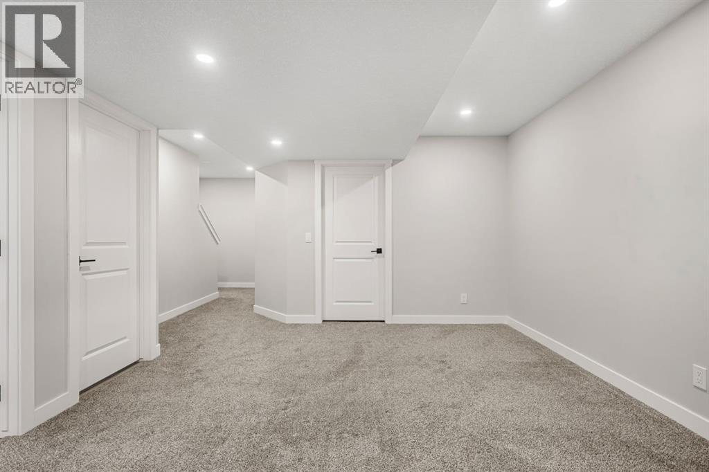 102 Midgrove Greenway SW, Airdrie, Alberta  T4B 5K7 - Photo 34 - A2335008