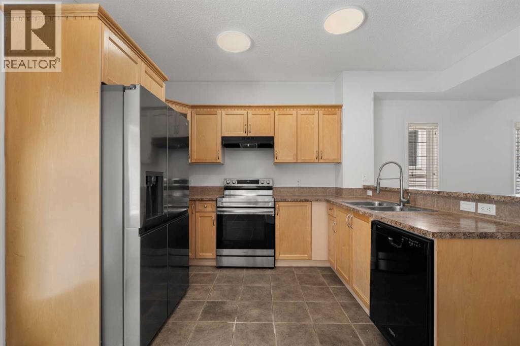 301 Strathaven Mews, Strathmore, Alberta  T1P 1K3 - Photo 7 - A2326891