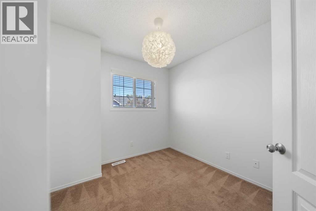 301 Strathaven Mews, Strathmore, Alberta  T1P 1K3 - Photo 22 - A2326891