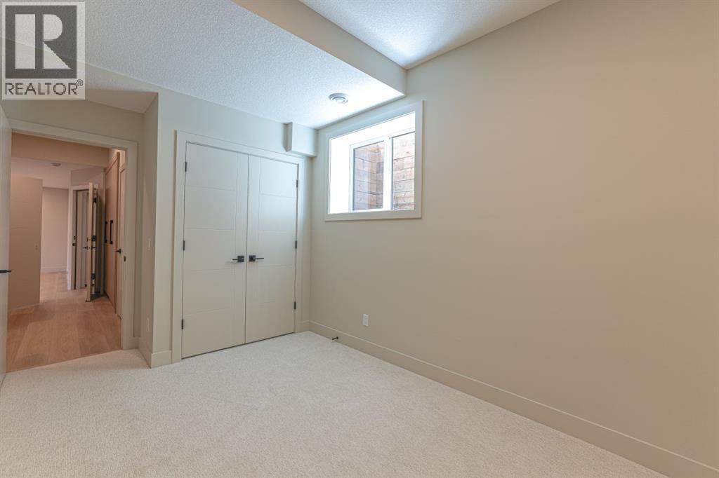 147 Heston Street NW, Calgary, Alberta  T2K 2C5 - Photo 39 - A2329022