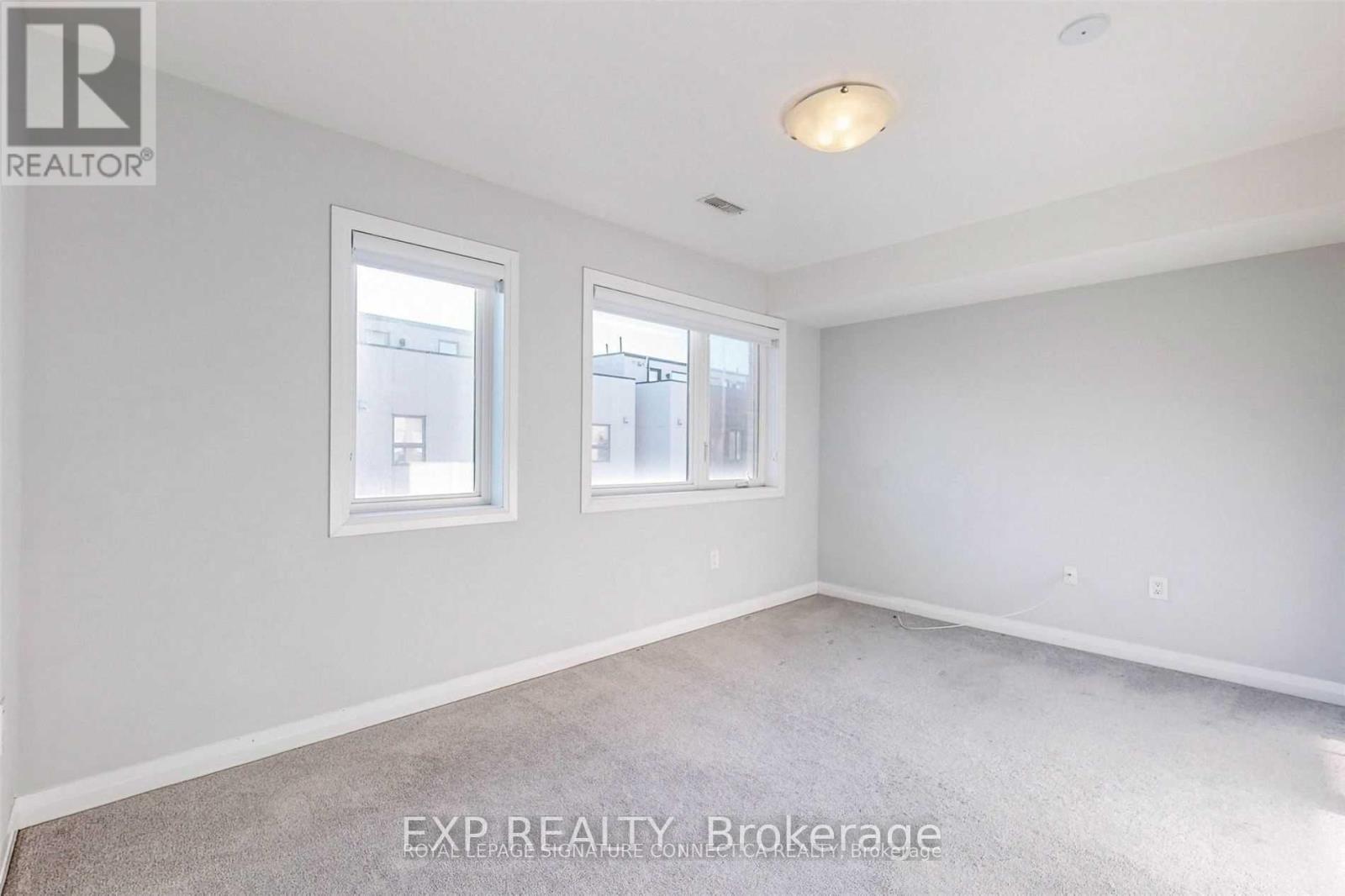 16 Caroline Carpenter Grove, Toronto, Ontario  M3K 0B1 - Photo 3 - W13654840