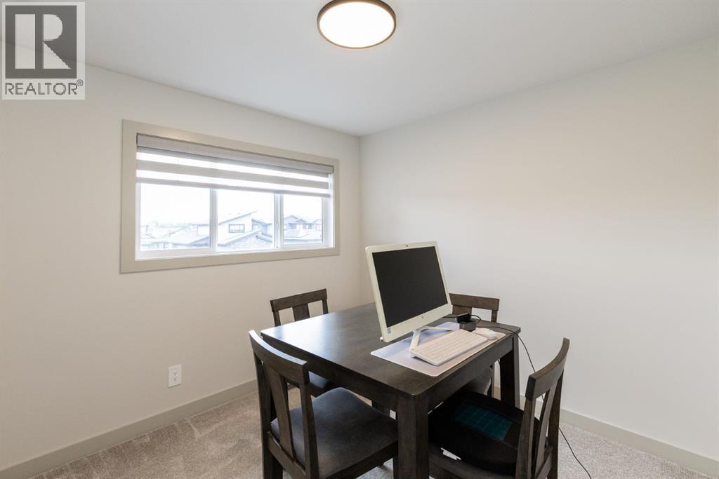 22 Napoleon Meadows Way, Innisfail, Alberta  T4G 0N6 - Photo 40 - A2328524