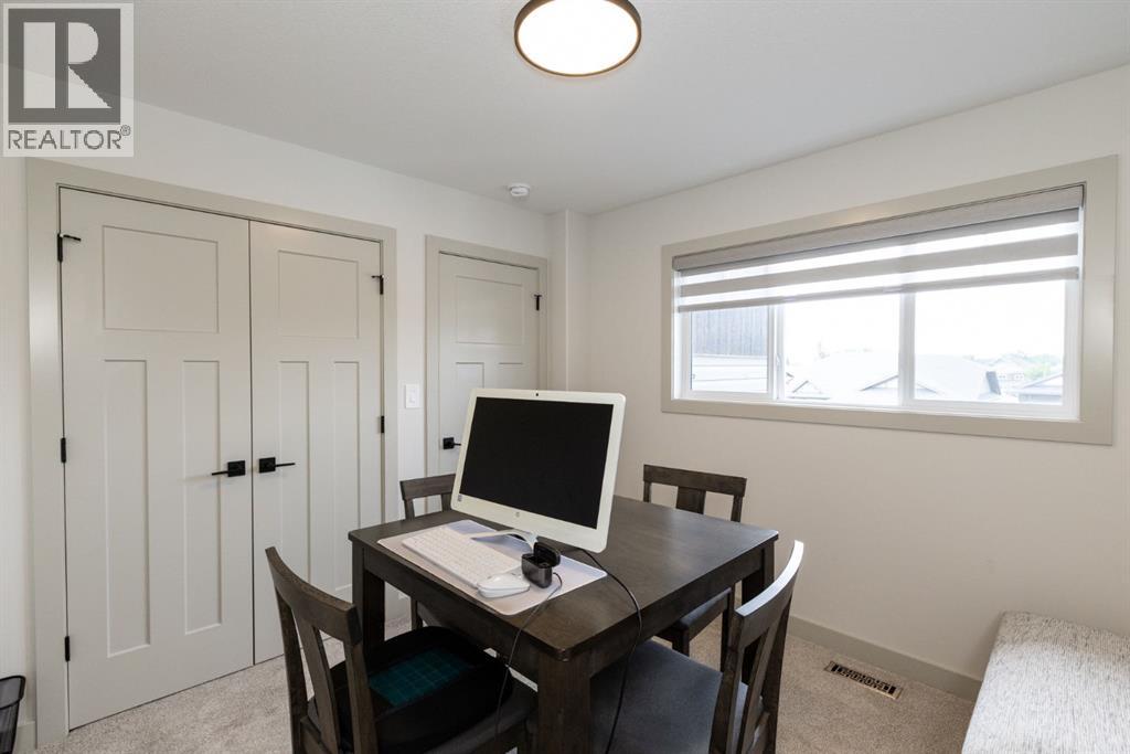 22 Napoleon Meadows Way, Innisfail, Alberta  T4G 0N6 - Photo 41 - A2328524