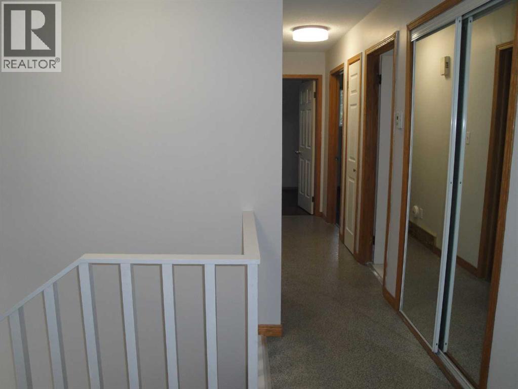 31 Huntford Road NE, Calgary, Alberta  T2K 3Y8 - Photo 12 - A2332760