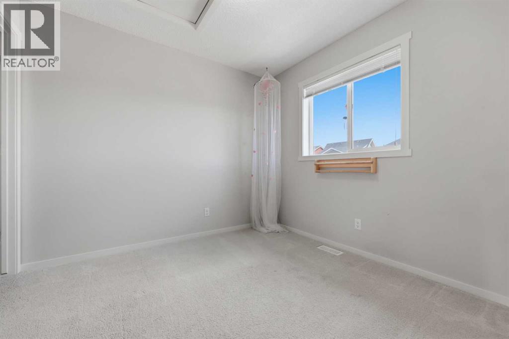 93 Sunvalley Road, Cochrane, Alberta  T4C 0X7 - Photo 23 - A2333475