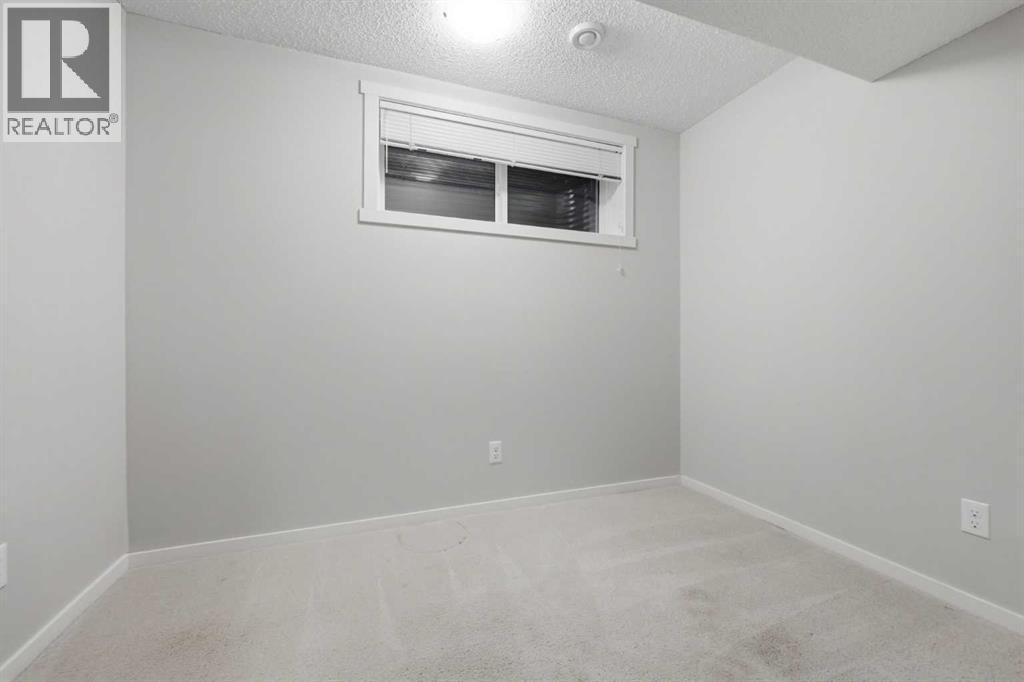 93 Sunvalley Road, Cochrane, Alberta  T4C 0X7 - Photo 36 - A2333475